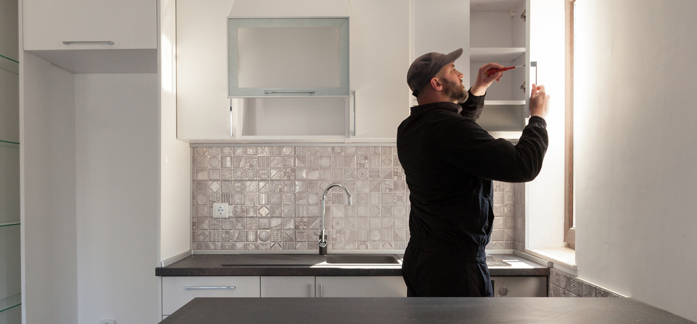 Man renovating kitchen