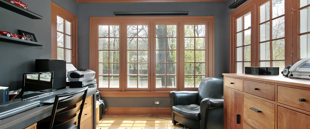 Home office with large windows