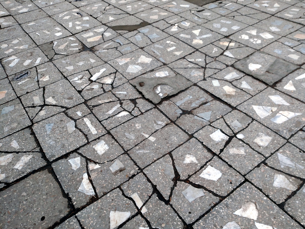 Cracked pavement made from stones